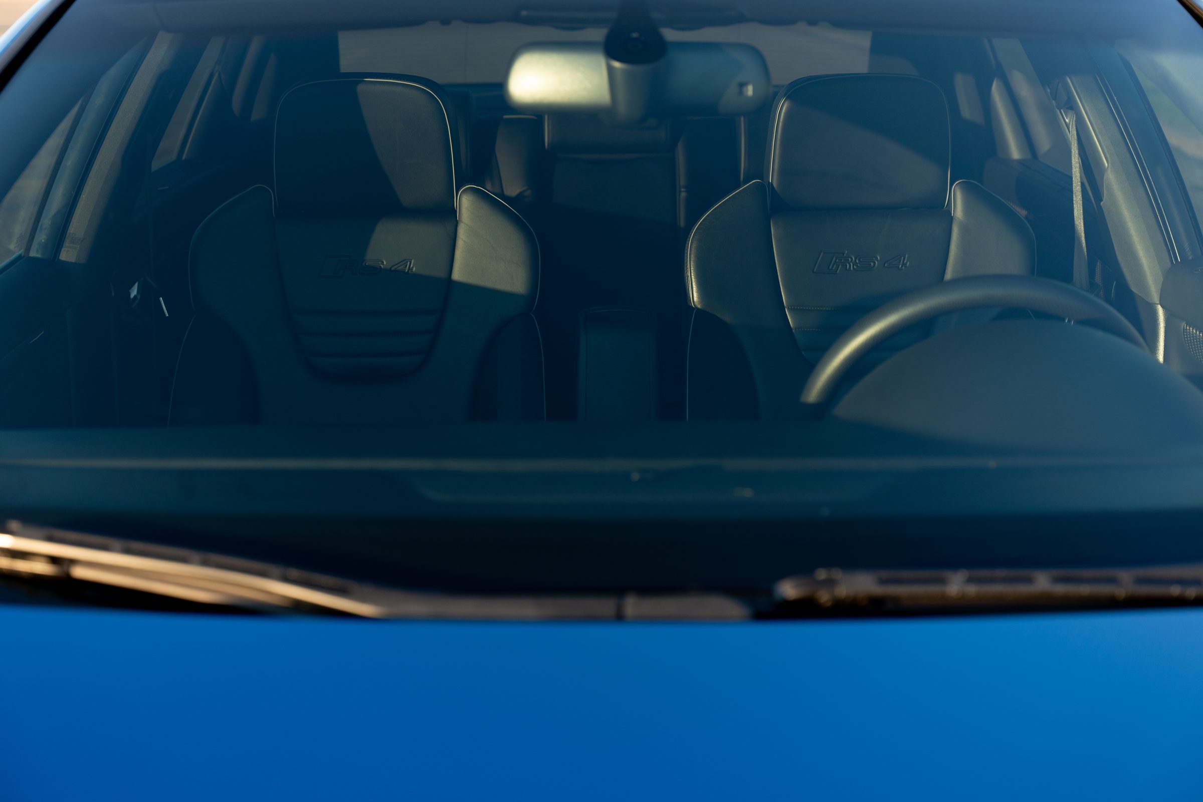 Front seats viewed through windshield