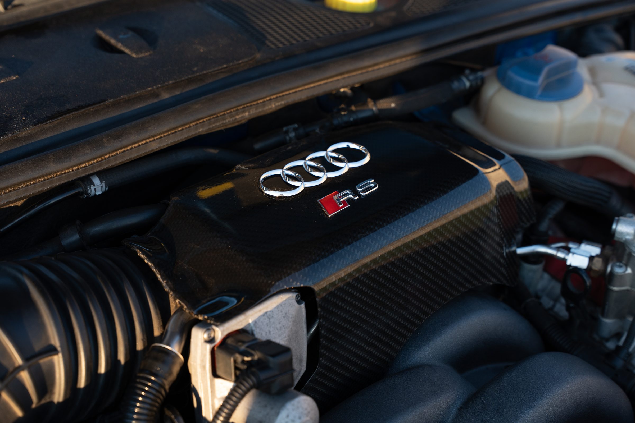Audi RS badge on carbon engine cover